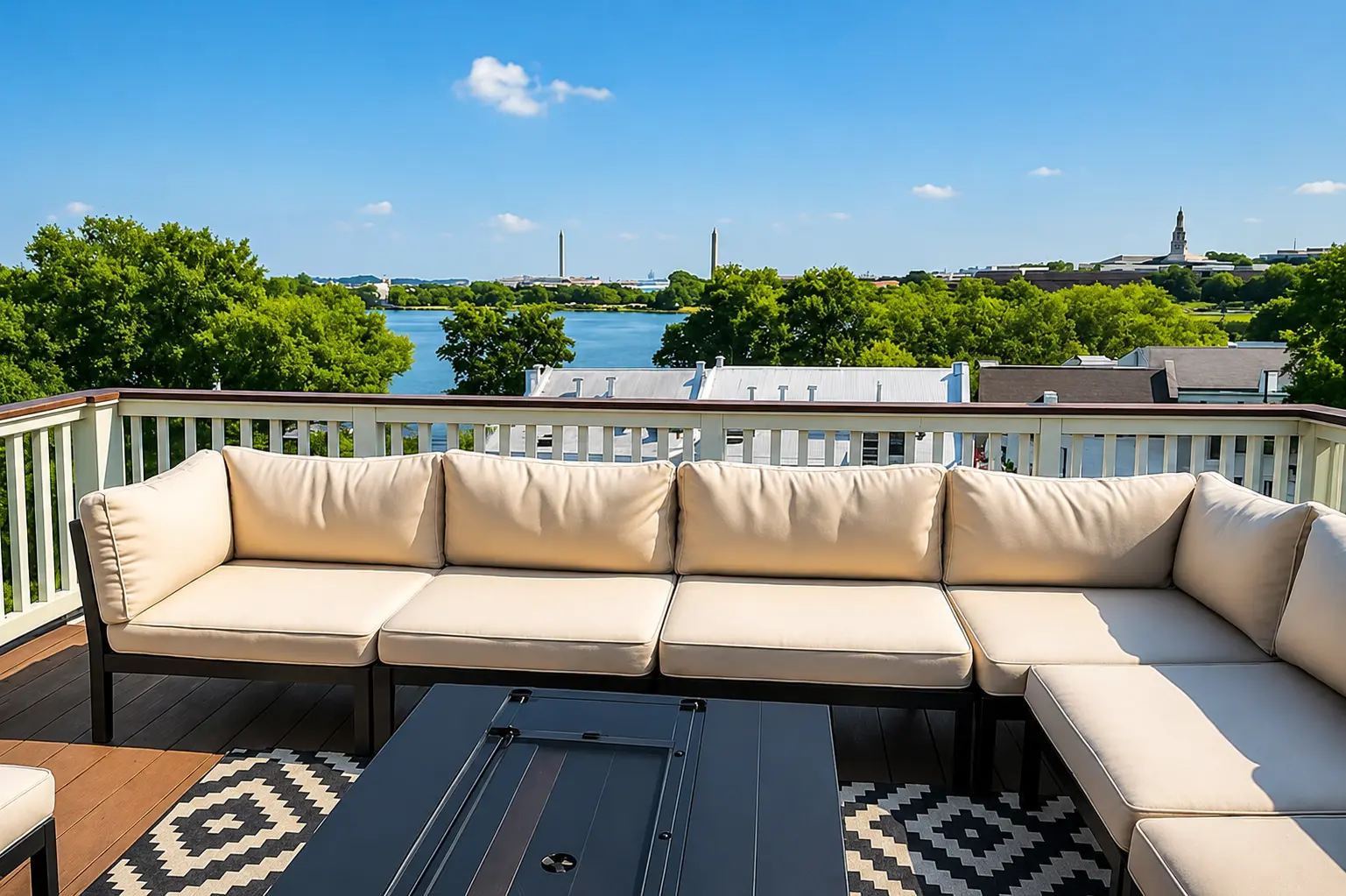 Rooftop lounge overlooking trees and the McMillan Reservoir
